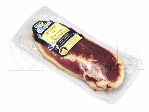 Confezionamento di tranci d'anatra con termoformatrice sottovuoto in film flessibile