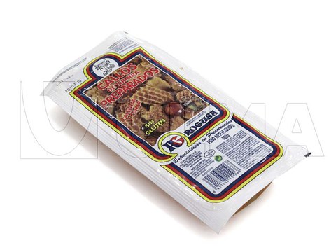 Confezionamento di piatti pronti in termoformatrice sottovuoto in film flessibile