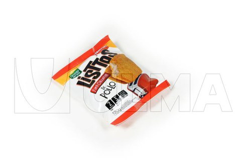 Confezionamento filetti di carne impanati e congelati.