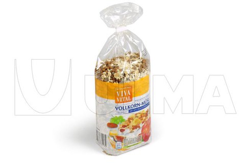 Confezione muesli con fondo stabile e richiudibile con clip in macchina verticale flow pack